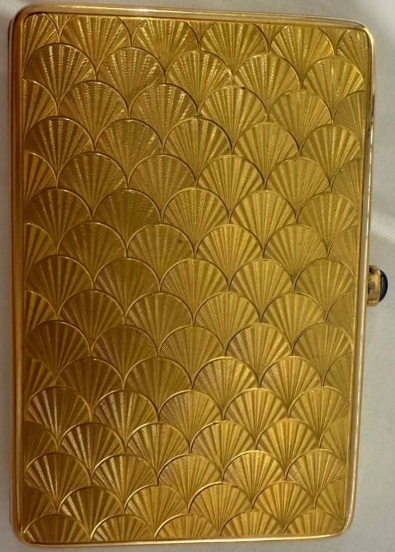 Gold Japonisme card case set with royal blue cabochon sapphire push. Paul Frey for Lacloche Freres. Paris c.1910