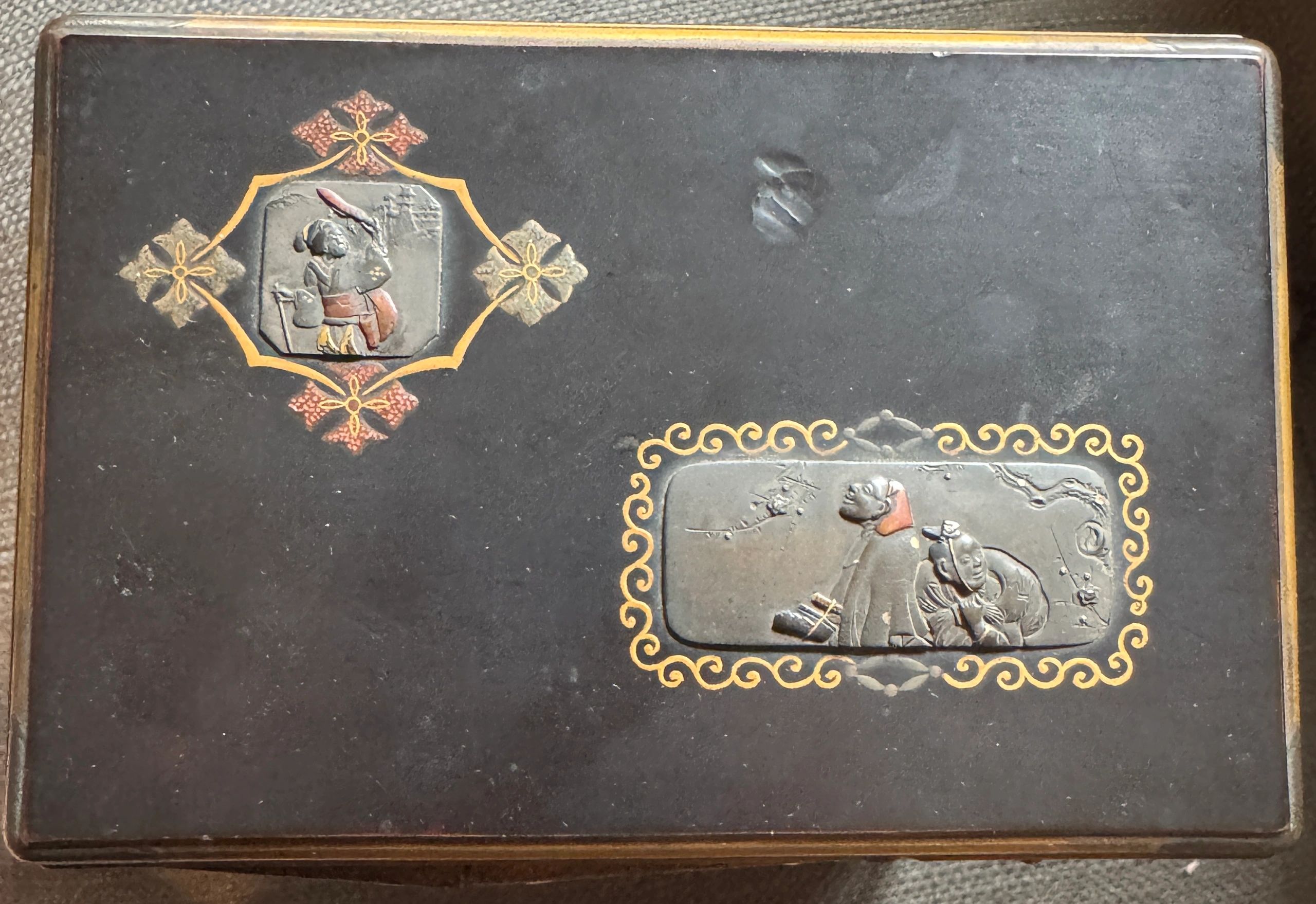 Shibayama Kodansu set with mixed metal Shakudo motifs, interior view