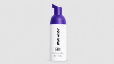 Wella White V34 Colour Correction Foam in a white bottle with a purple cap.