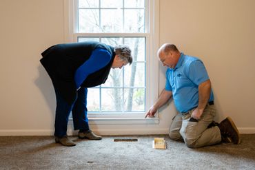 An air distribution system is made up of supply and return ducts. Inspecting an air supply duct.