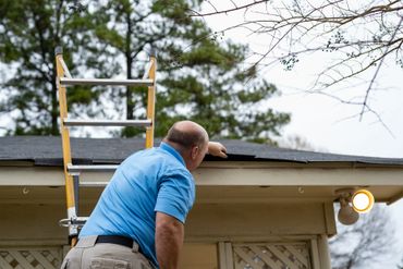 Inspecting the roof. 