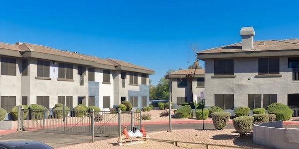 Apartment complex with custom solar screens to reduce tenant expenses and cooling costs. Keeping the community cool.