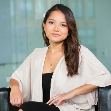A Woman Sitting on a Chair