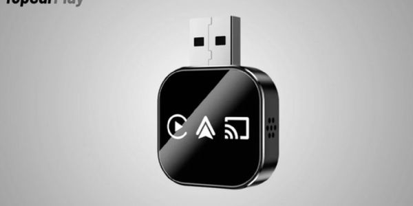 Compact black USB device with media streaming icons on its surface.
