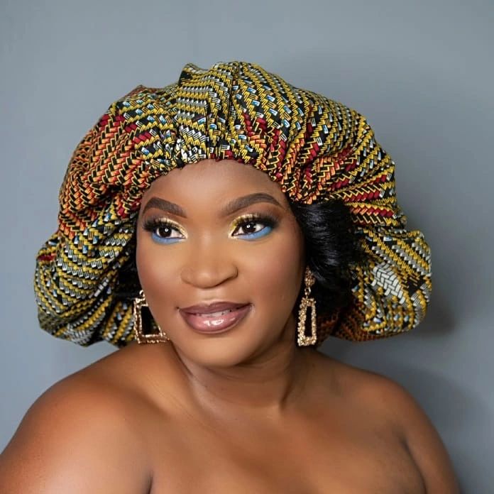 Edzorna, Owner of African Bonnets by Edzorna, a top seller of Handmade Kente Cloth Hair Bonnets
