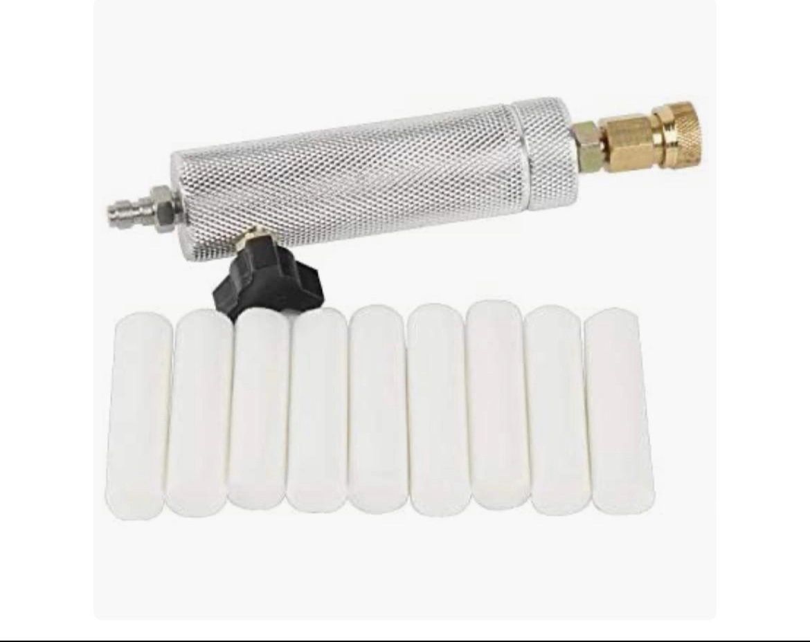 Inline moisture filter with bleed off valve