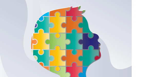 child's head in profile with filled in with colorful puzzle pieces.