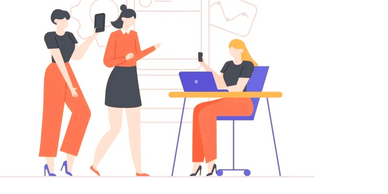 Three women collaborating with digital devices in a modern workspace.