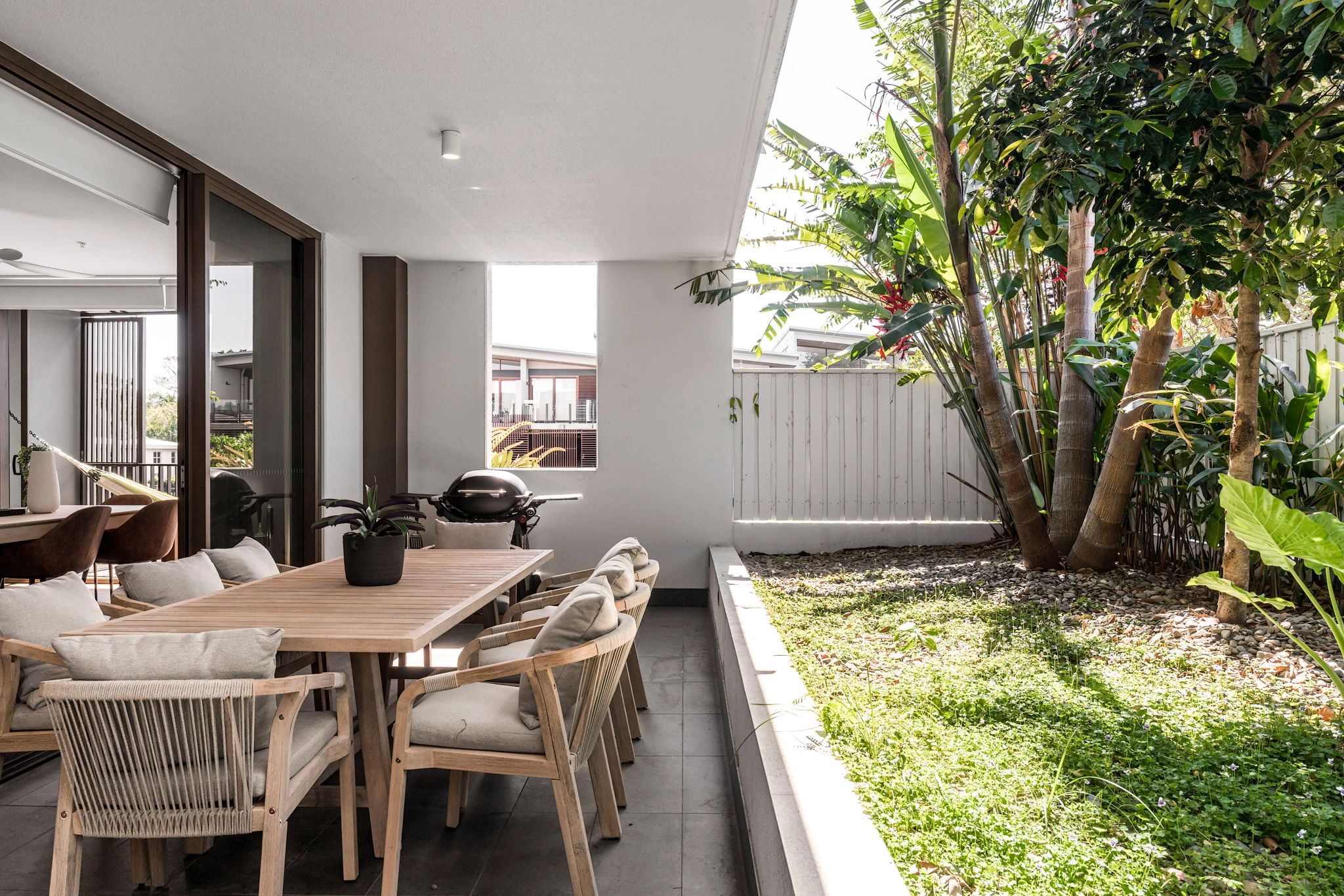 Covered outdoor dining and alfresco space on the balcony