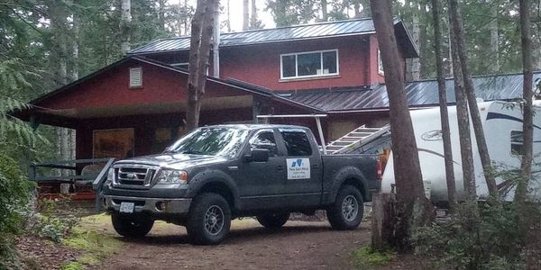 We specialize in custom metal roofs with custom flashings and built in gutters.  We also do 2- ply T