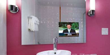 Mirror with TV