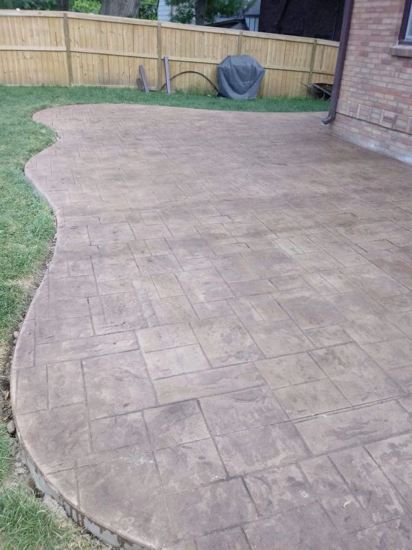 Stamped concrete patio with patterned design.