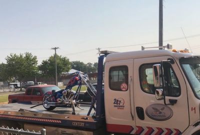 Towing a motorcycle, motorcycle towing in Davenport, IA, Quad Cities, flatbed tow truck 