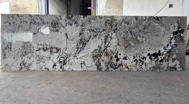 Alaska Gold granite slab - polished natural stone supplied by Heritage Overseas Thailand.
