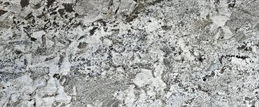 Azul White granite slab - polished natural stone supplied by Heritage Overseas Thailand.