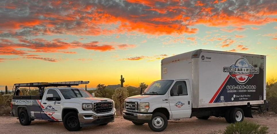 Precise Air & Heating Local Branded Trucks with Arizona Sunset in Background in the east valley.
