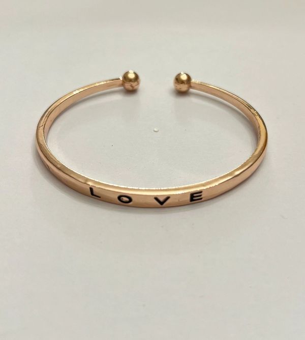 Gold Love Engraved bangle/bracelet.