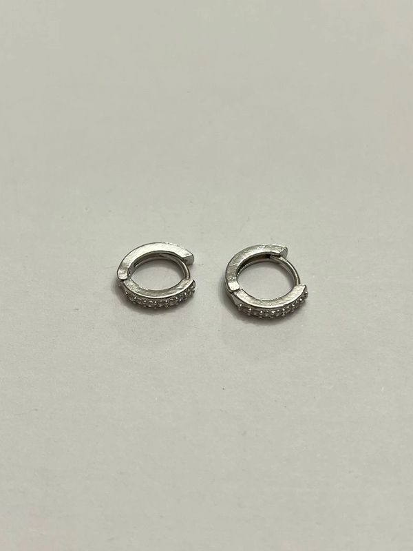 Silver earrings with rhinestone.