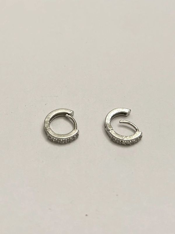 Silver stacking rings with rhinestone.