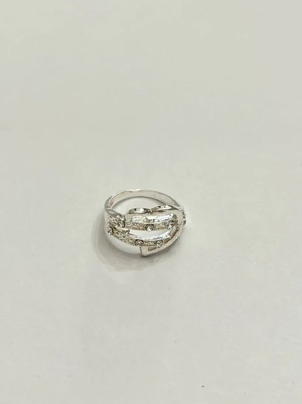 Multi-band or stacked style ring with a silver finish.