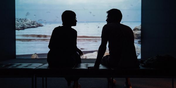 Two people at an aquarium