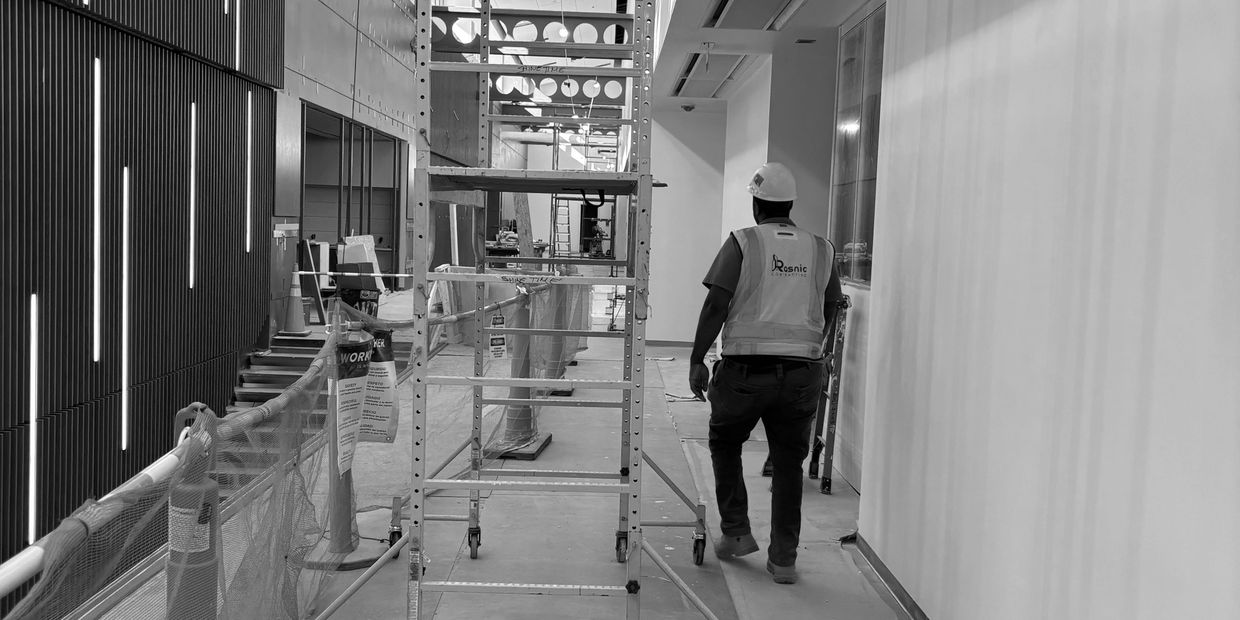 Co-founder of Rasnic at a wall panel and ceiling installation project in Langley, Virginia.