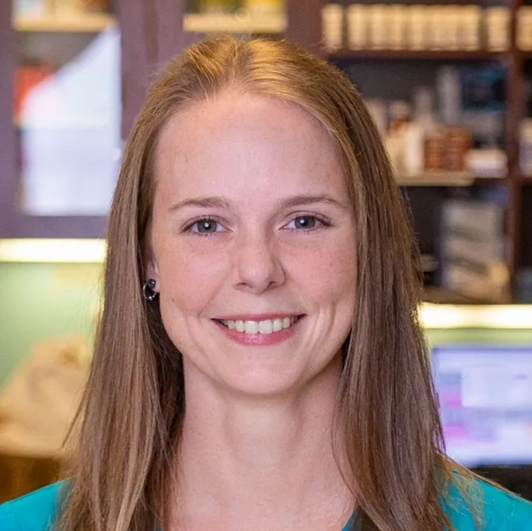 Head shot of Megan looking forward and smiling