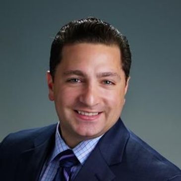 Smiling man in business suit.