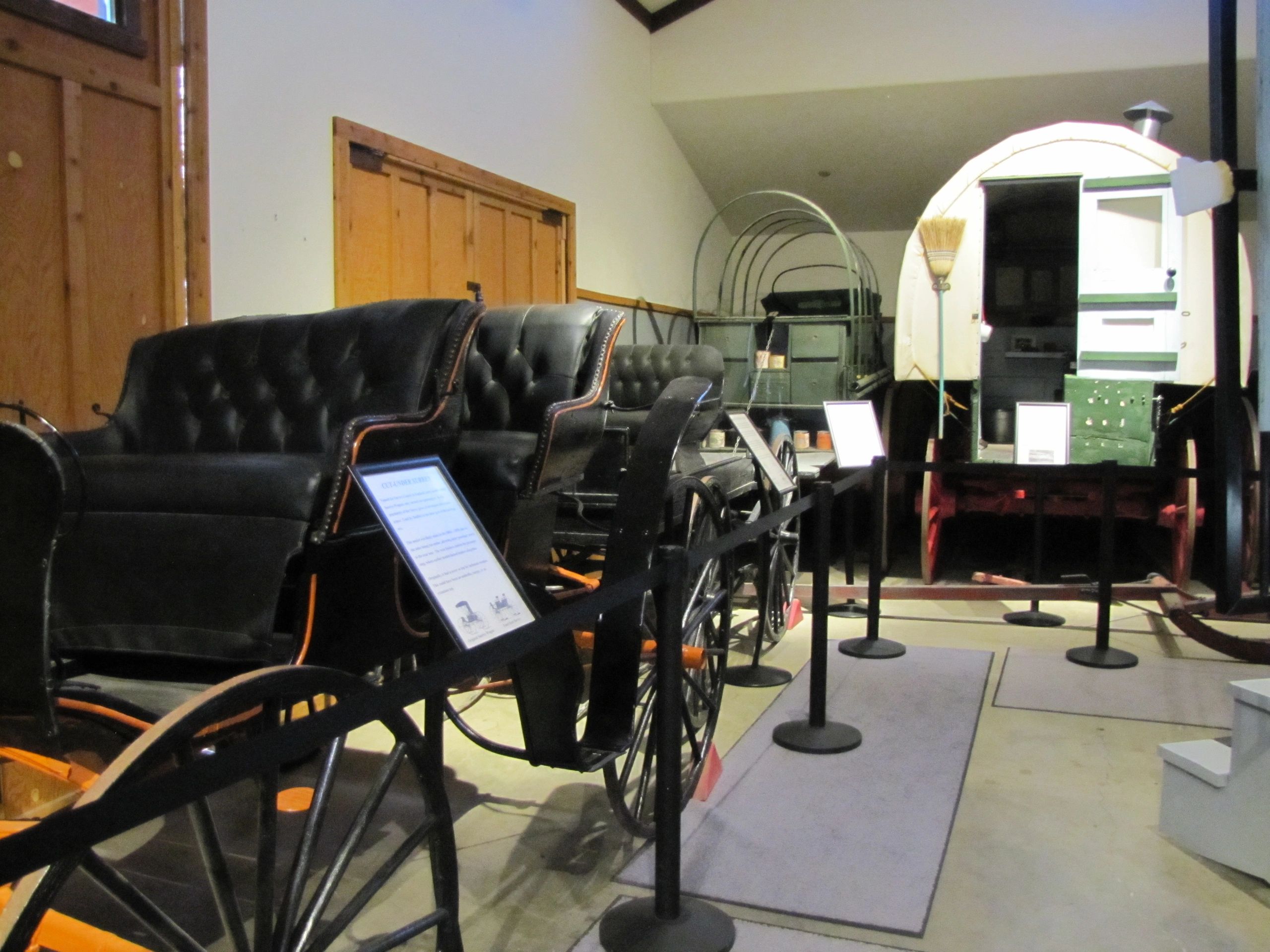 a group of wagons inside a building