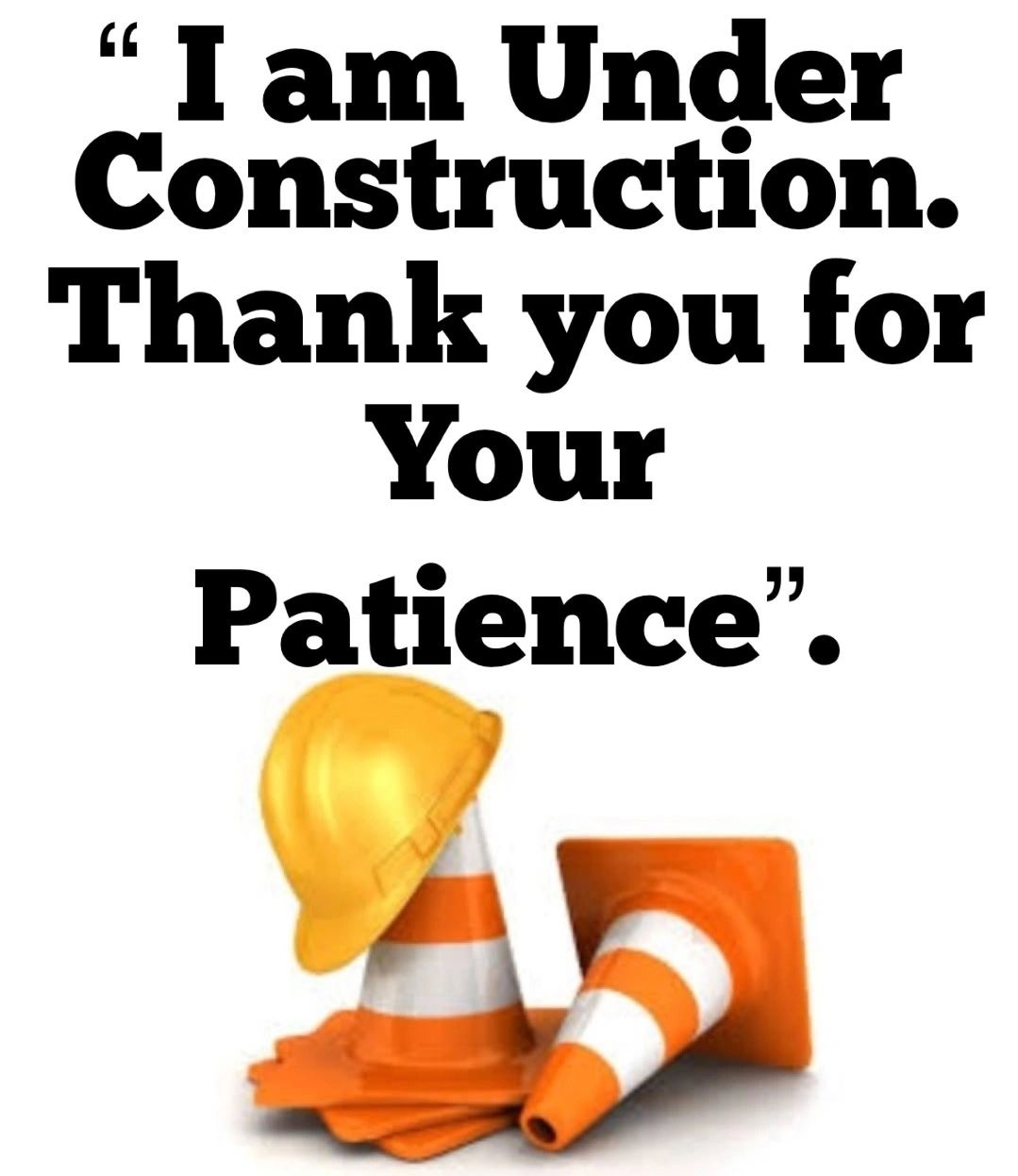 Under construction sign with cones and helmet.