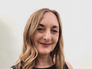 Melina Sarra-May BACP Counsellor. A warm gentle smile on her face 