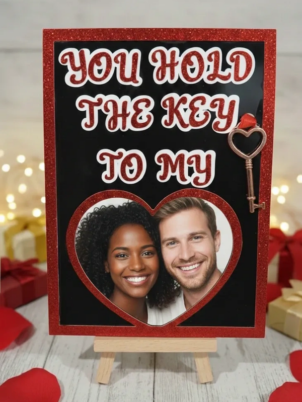 Romantic sign with a photo and key saying, 'You hold the key to my heart.'