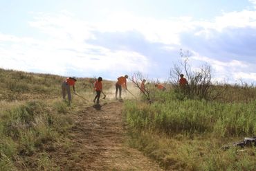 Volunteers finishing trail.