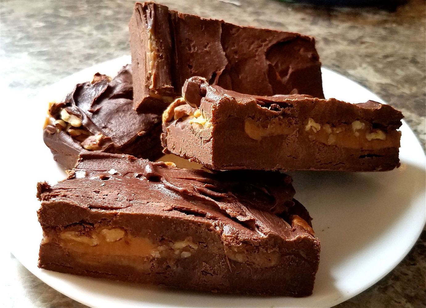 Stacks of our caramel pecan fudge blocks.