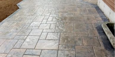 Concrete contractor poured stamped concrete patio in Hernando, MS.