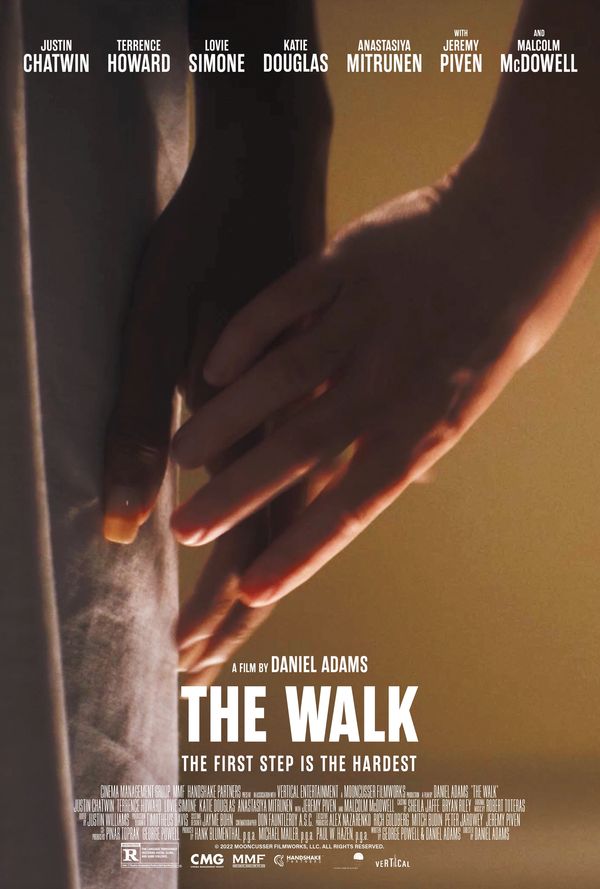 Movie poster for 'The Walk' showing two hands almost touching.