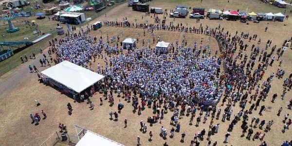 Crowd of Kyles at KyleFair 2024, gathered with excitement, aiming to break the world record together