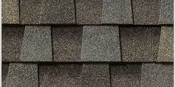 Close-up of asphalt roof shingles.