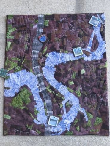 Along the River. Collage, image transfer. Machine quilted.  18" x 23" 