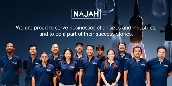 Team photo of Najah with a company mission statement.