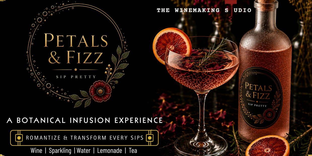 Petals &amp; Fizz botanical infusion drink with citrus garnish in elegant glass.