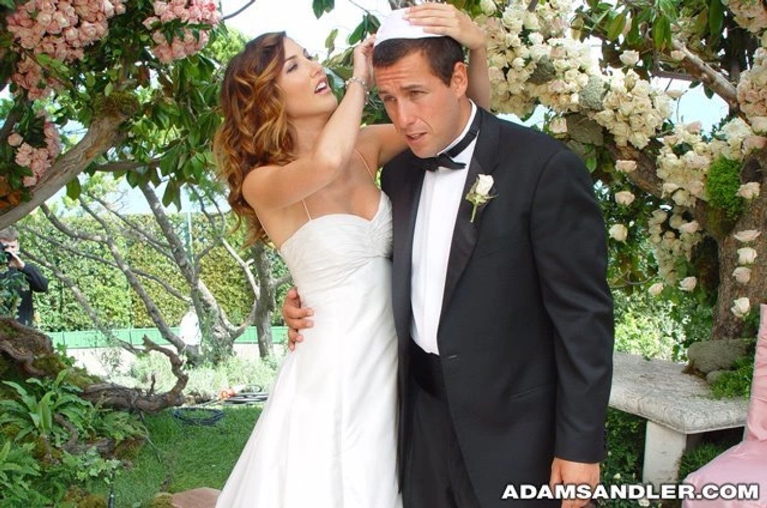 Bride and wedding planner sharing a happy moment during wedding preparations.