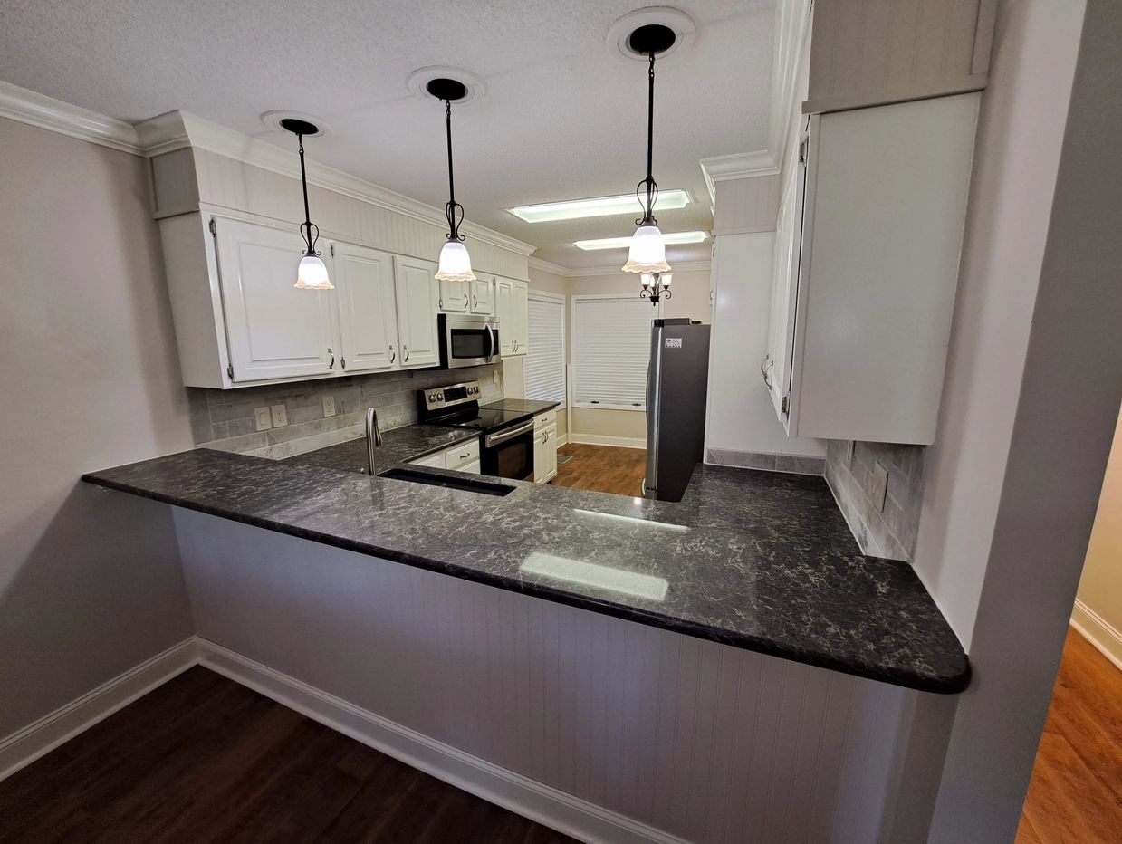 Kitchen remodeling - incl crown, lights, paint, back splash, baseboards and cabinet painting.