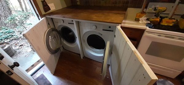 Custom creation... washer and dryer enclosure with folding top... we call it a 'laundry center'...