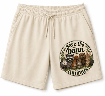 Beige shorts with animal graphic and 'Save the Damn Animals' text.