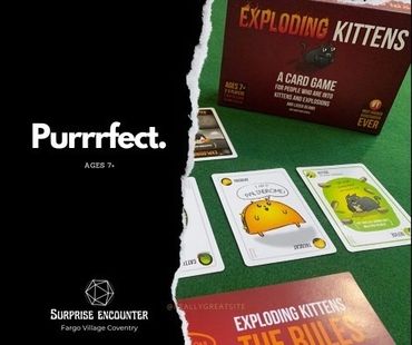 Image of card game Exploding Kittens. Cards are laid out on green felt. The diffuse card is visible