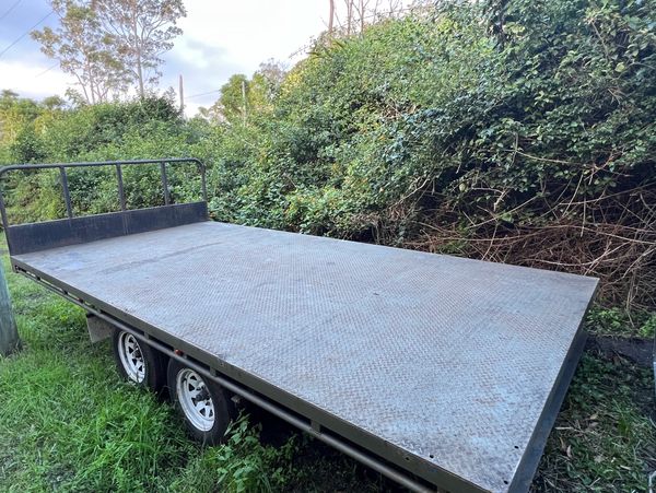 image of 16 foot flat bed trailer