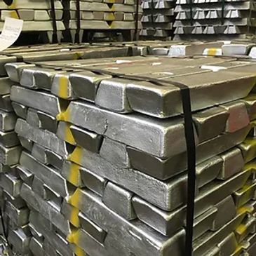 Stacks of silver metal bars tied together.