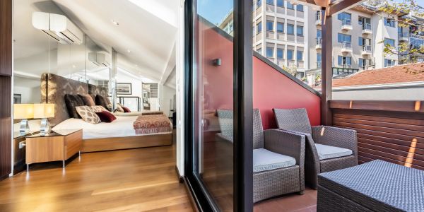 Penthouse bedroom opening onto a private terrace at Deger 16 Residences, Nişantaşı