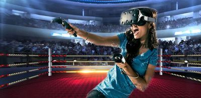 A young girl located in a boxing ring wearing a virtual reality headset